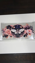 new arrival moth and light pink flower